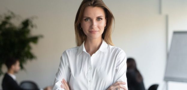 Portrait of successful businesswoman posing with arms crossed Portrait of successful businesswoman posing with arms crossed