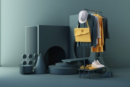 Clothes a hanger surrounding by bag and market prop with geometric shape on the floor in yellow and green color. 3d rendering Clothes a hanger surrounding by bag and market prop with geometric shape on the floor in yellow and green color. 3d rendering