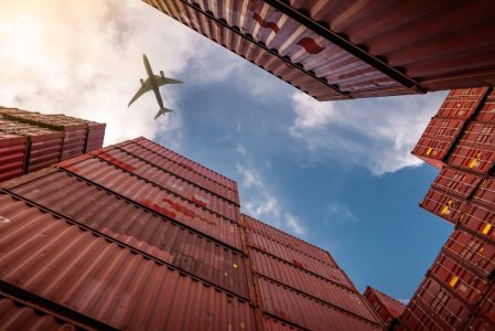 Airplane flying above container logistic. Cargo and shipping business. Container ship for import and export logistic. Logistic industry from port to port. Container at harbor for truck transport. Airplane flying above container logistic. Cargo and shipping business. Container ship for import and export logistic. Logistic industry from port to port. Container at harbor for truck transport.