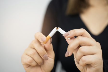 A woman with a cigarette A woman with a cigarette