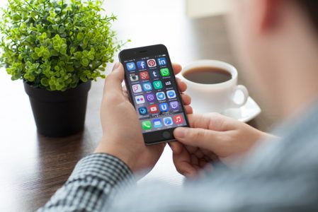 Set of social networking on iPhone 6 in man hands Set of social networking on iPhone 6 in man hands