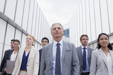 Confident business people looking ahead Confident business people looking ahead